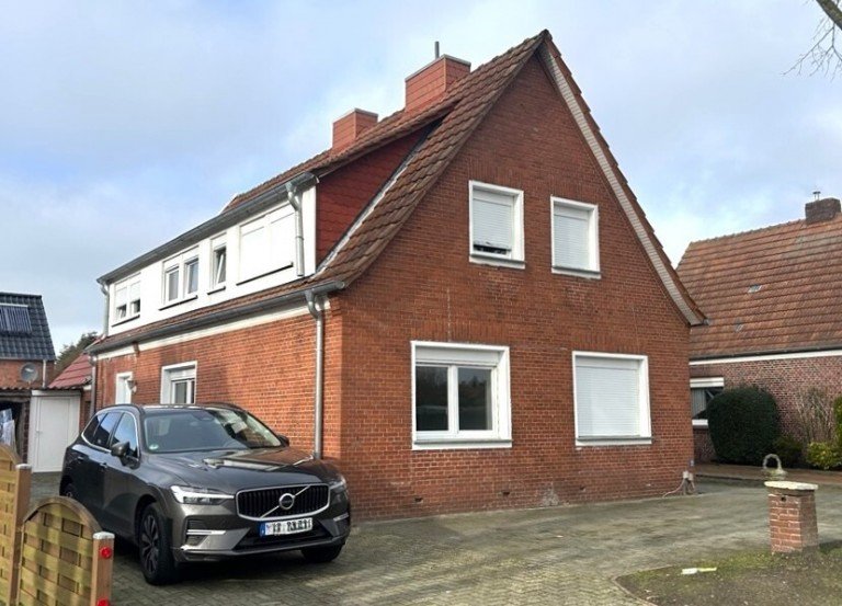 Stra�enansicht Moormerland Zweifamilienhaus Ohne K�uferprovision! Vermietetes ZFH in Moormerland. Eigenbedarf oder Kapitalanlage.