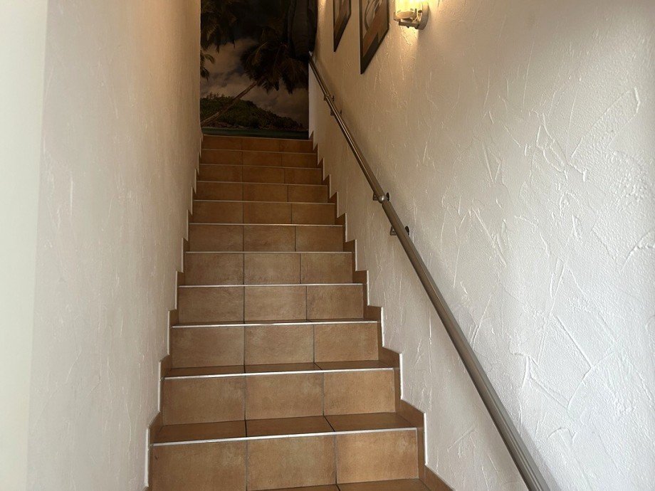 Treppenaufgang zum DG Zweifamilienhaus Bakum / Hausstette