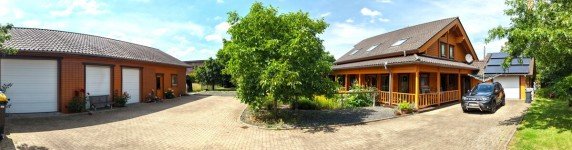 Hauptbild Wohnen und Arbeiten in Perfektion! Öko-Blockhaus mit separatem Gewerbegebäude in Dinklage.